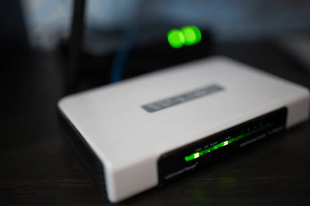 Home Wi-Fi router with its status lights on